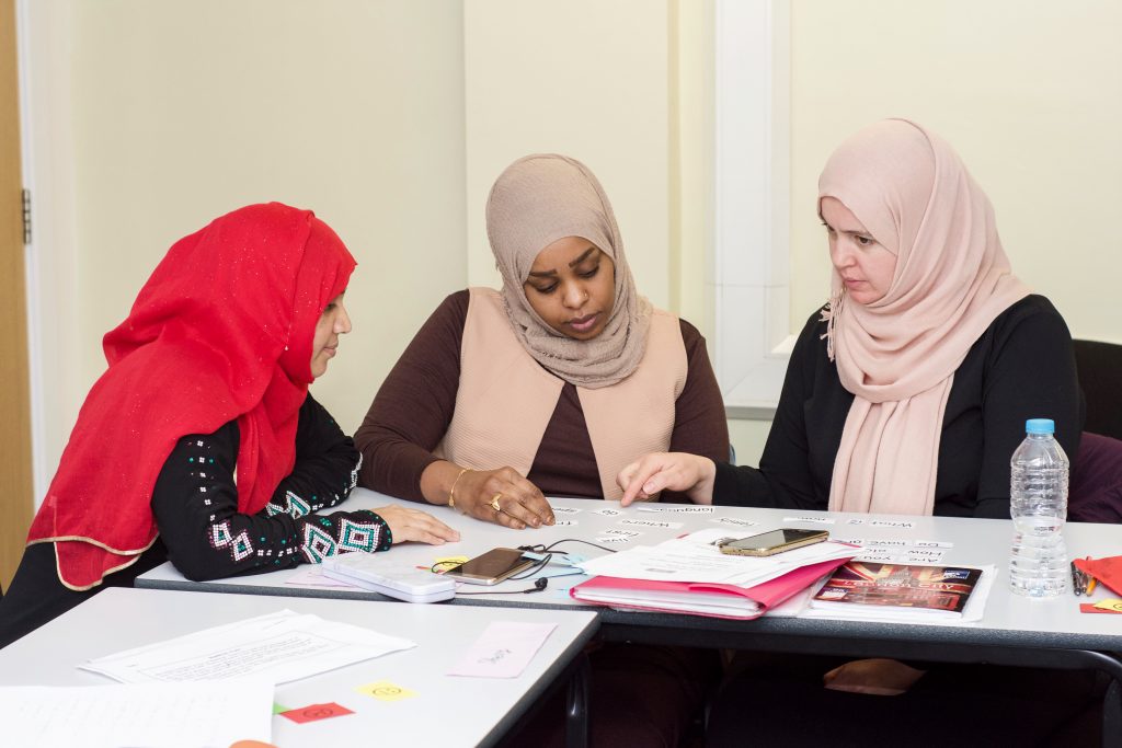 Students learning English in a classroom