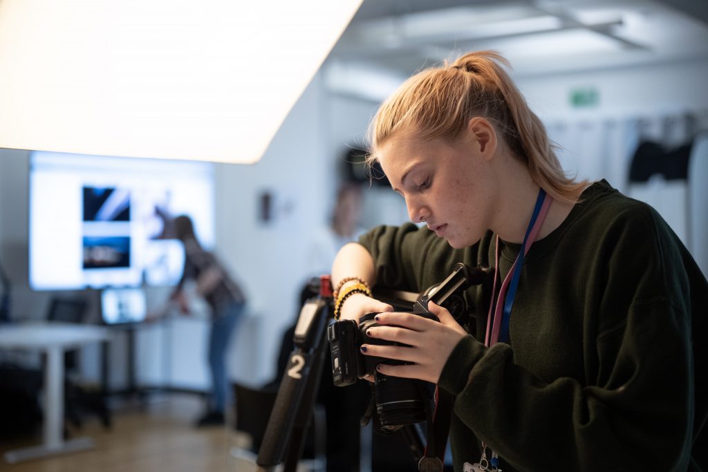 student looking into camera