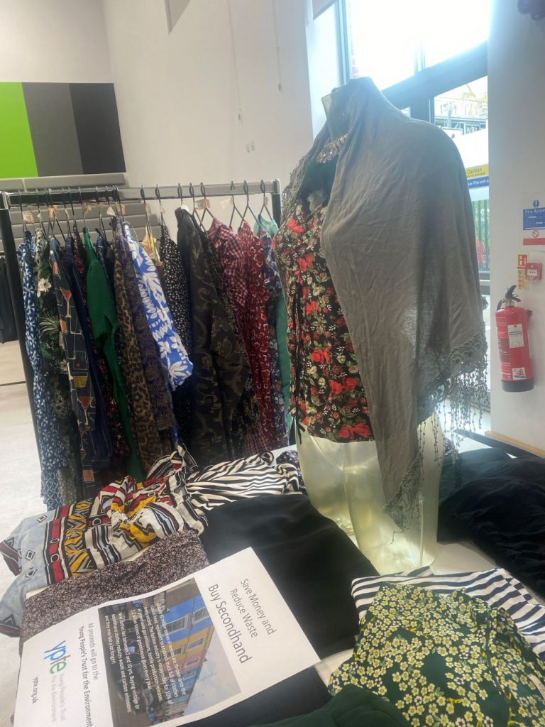 Clothes displayed at a vintage fair