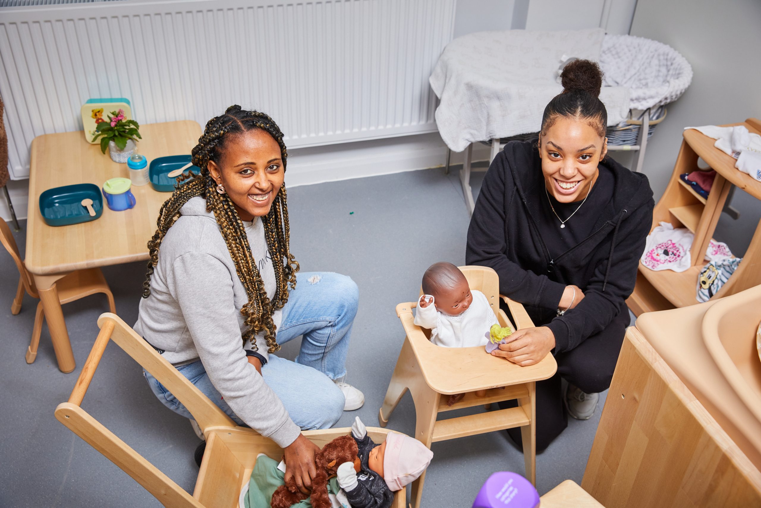 Two young black students in early years class